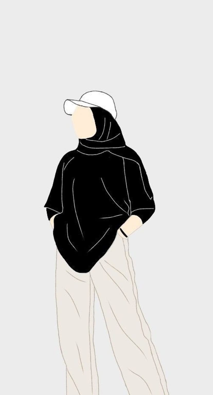 Muslim woman in a black hijab and white cap stands with hands in her pockets wearing beige pants and a dark top.