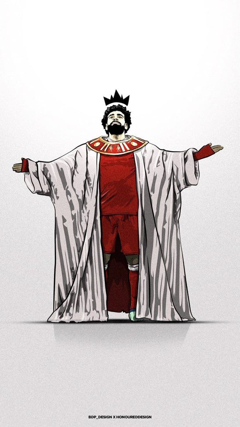 Mohamed Salah wears a gold-trimmed white pharaoh robe and crown over his red kit against a plain white background.