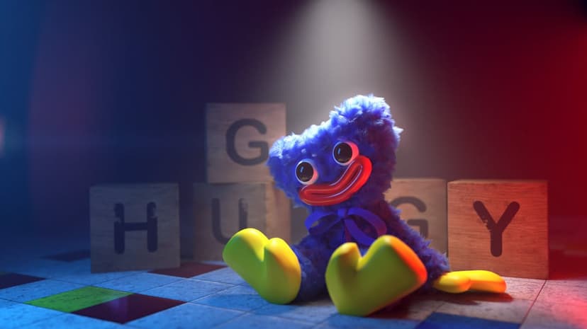 Blue furry Huggy Wuggy plush sits on a tiled floor with wooden letter blocks under a bright overhead spotlight.