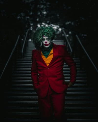 Arthur Fleck Joker Red Suit Cinematic Mobile Wallpaper
