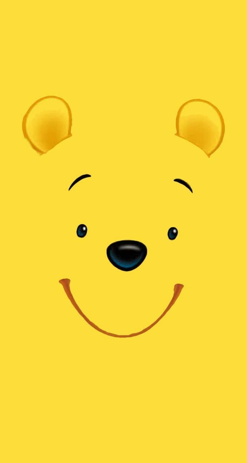 Winnie the Pooh's smiling face with black eyes and a small nose centered on a solid vibrant yellow background.