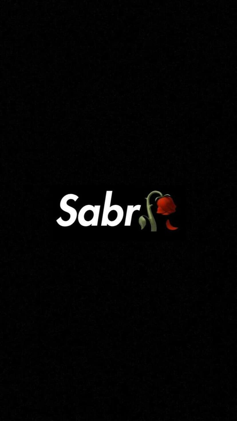 Arabic word Sabr in white font on a black background with a wilted red rose replacing the final letter.
