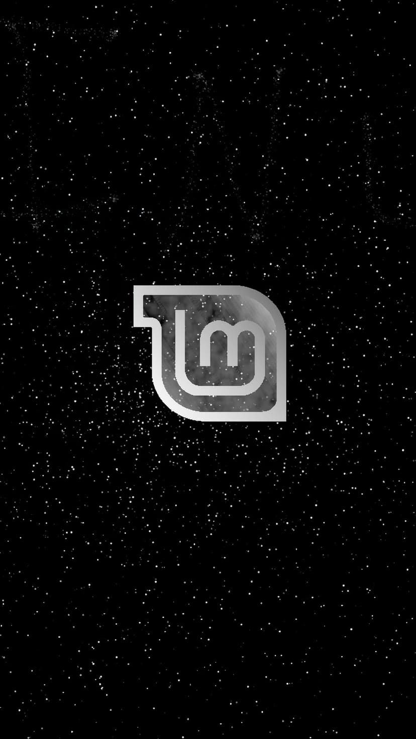 Linux Mint logo centered on a deep black background filled with tiny white stars and distant cosmic dust particles.