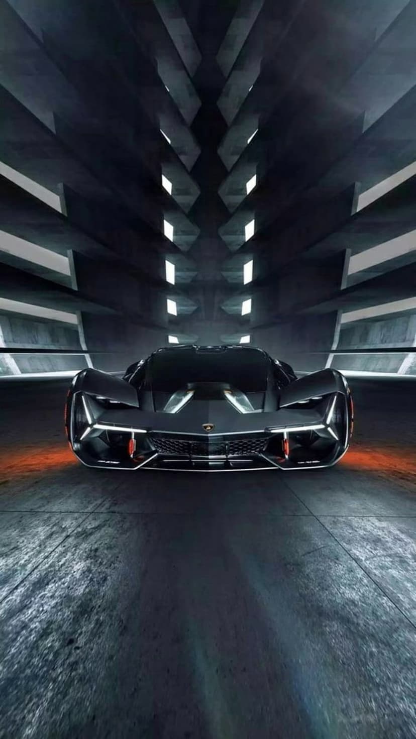 Lamborghini hypercar parked on a concrete floor inside a dark garage with orange glowing light reflections.