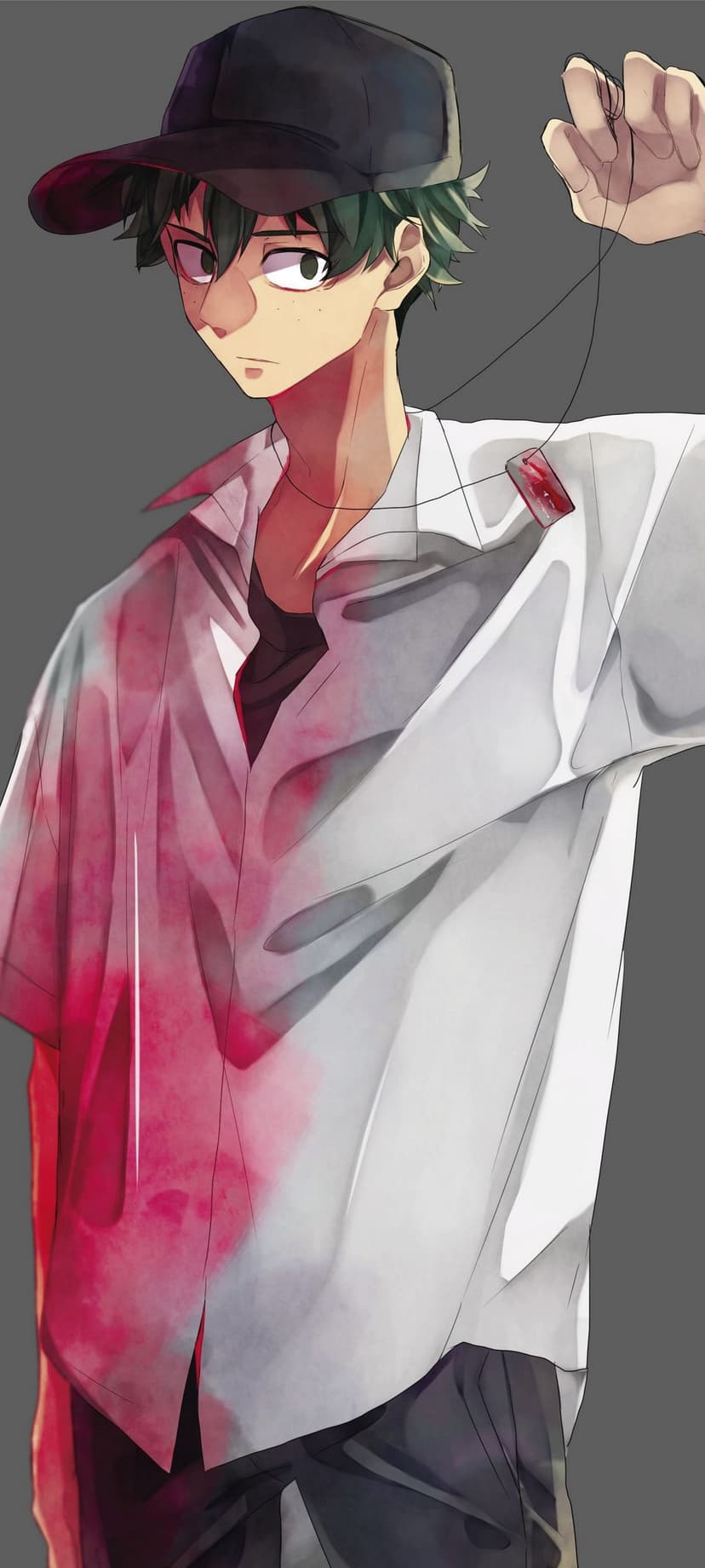 Green-haired youth in a black cap and blood-spattered white shirt holds a pendant against a grey background.