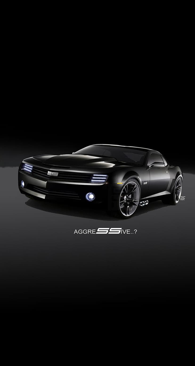 Black Chevrolet Camaro SS concept car with glowing headlights and stylized SS emblem against a dark background.
