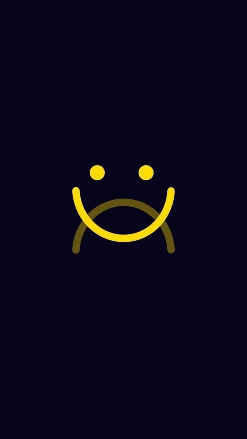 Yellow smiley face with two mouths showing happy and sad expressions centered on a solid black background.