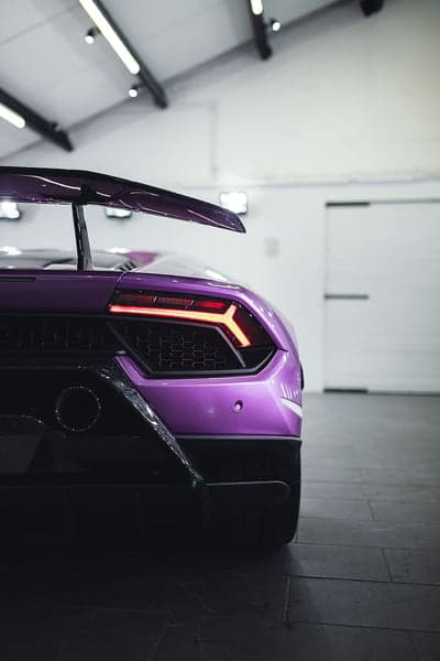 Neon Purple Lamborghini Tail Light Rear View Wallpaper