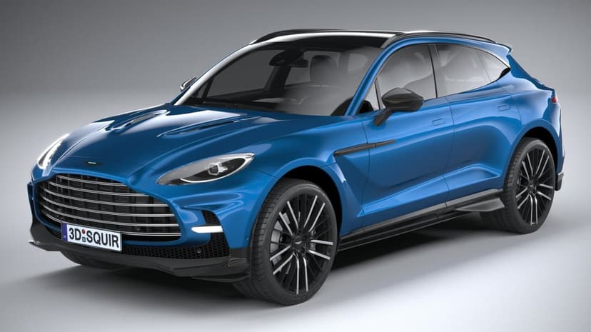 Blue Aston Martin DBX SUV with black roof and silver-rimmed wheels on a grey gradient studio background.