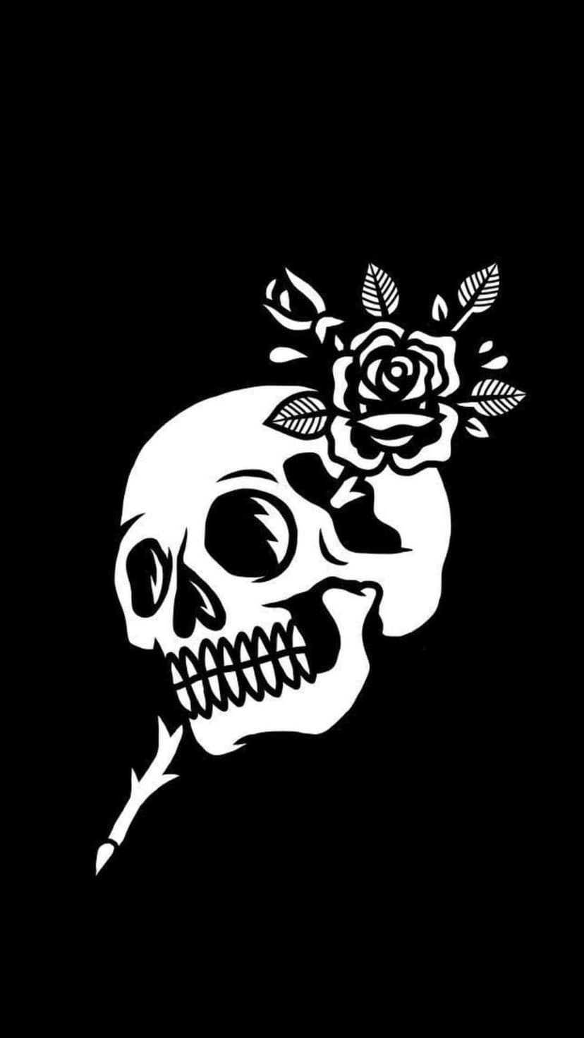 White skull profile integrated with a blossoming rose and thorny stem against a solid black background.