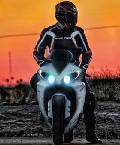 Motorcyclist Silhouette at Dusk Mobile Phone Wallpaper