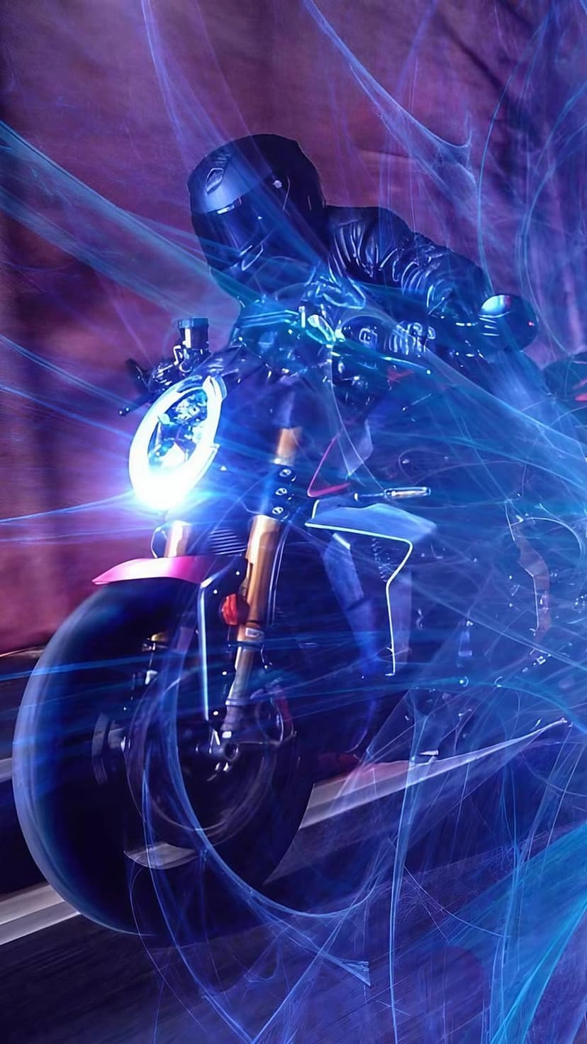 Motorcycle rider in a helmet and black leather jacket leans forward through glowing blue electric energy trails.