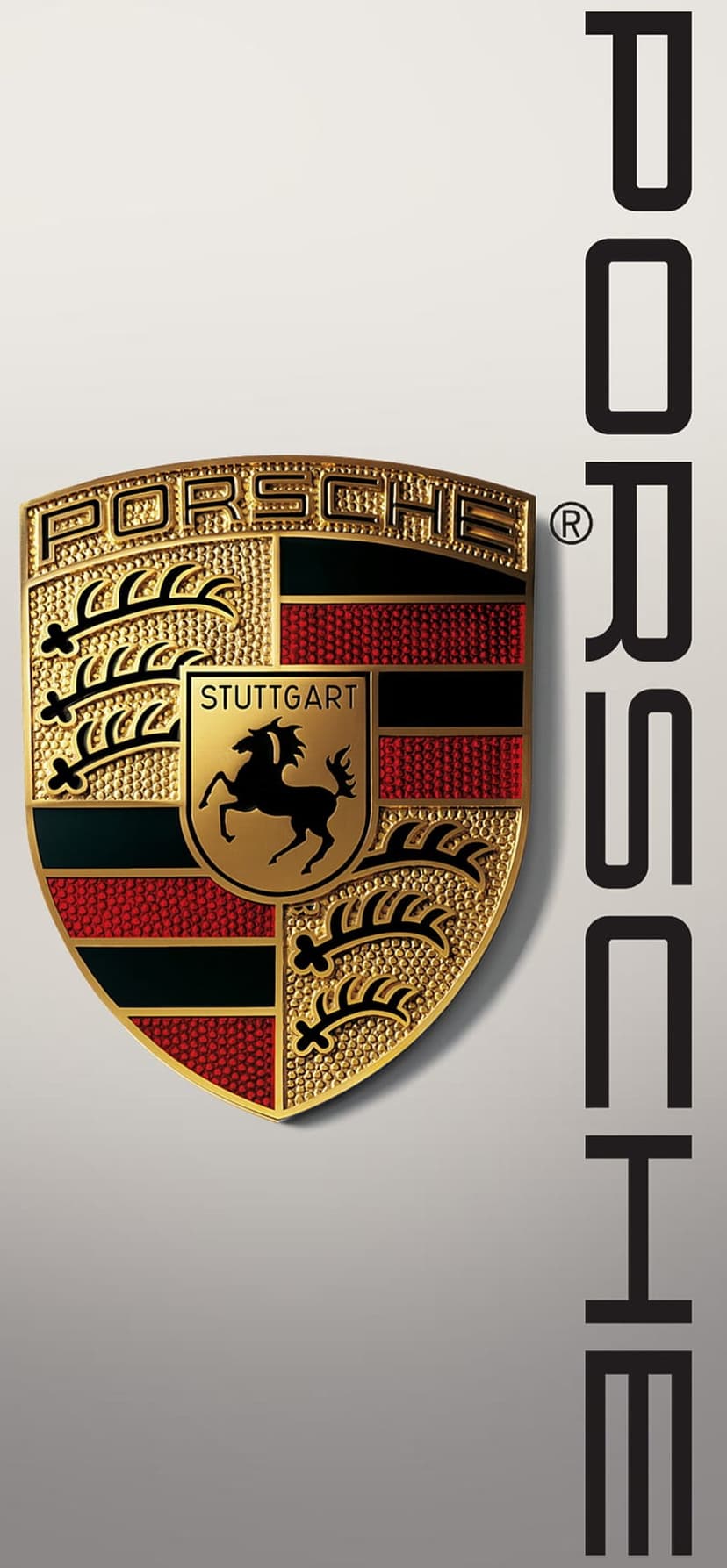 Golden Porsche crest emblem featuring a prancing horse beside vertical black text on a clean vertical background.
