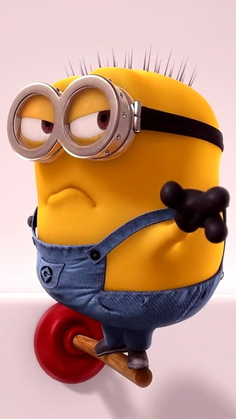 Yellow minion with a grumpy face and goggles balances atop a red plunger while wearing blue denim overalls.