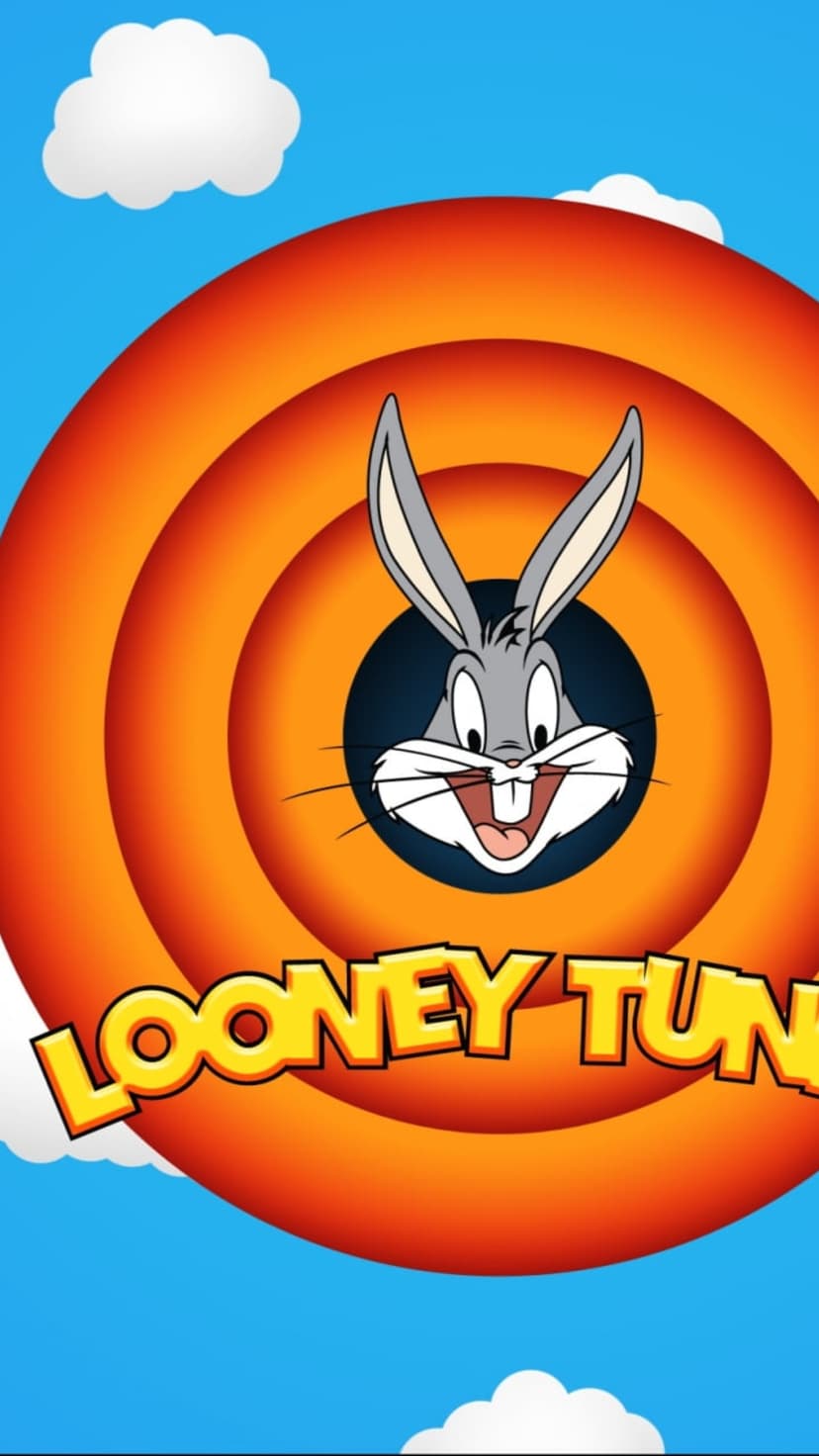 Bugs Bunny peers through orange concentric circles under a blue sky with white clouds and yellow logo lettering.