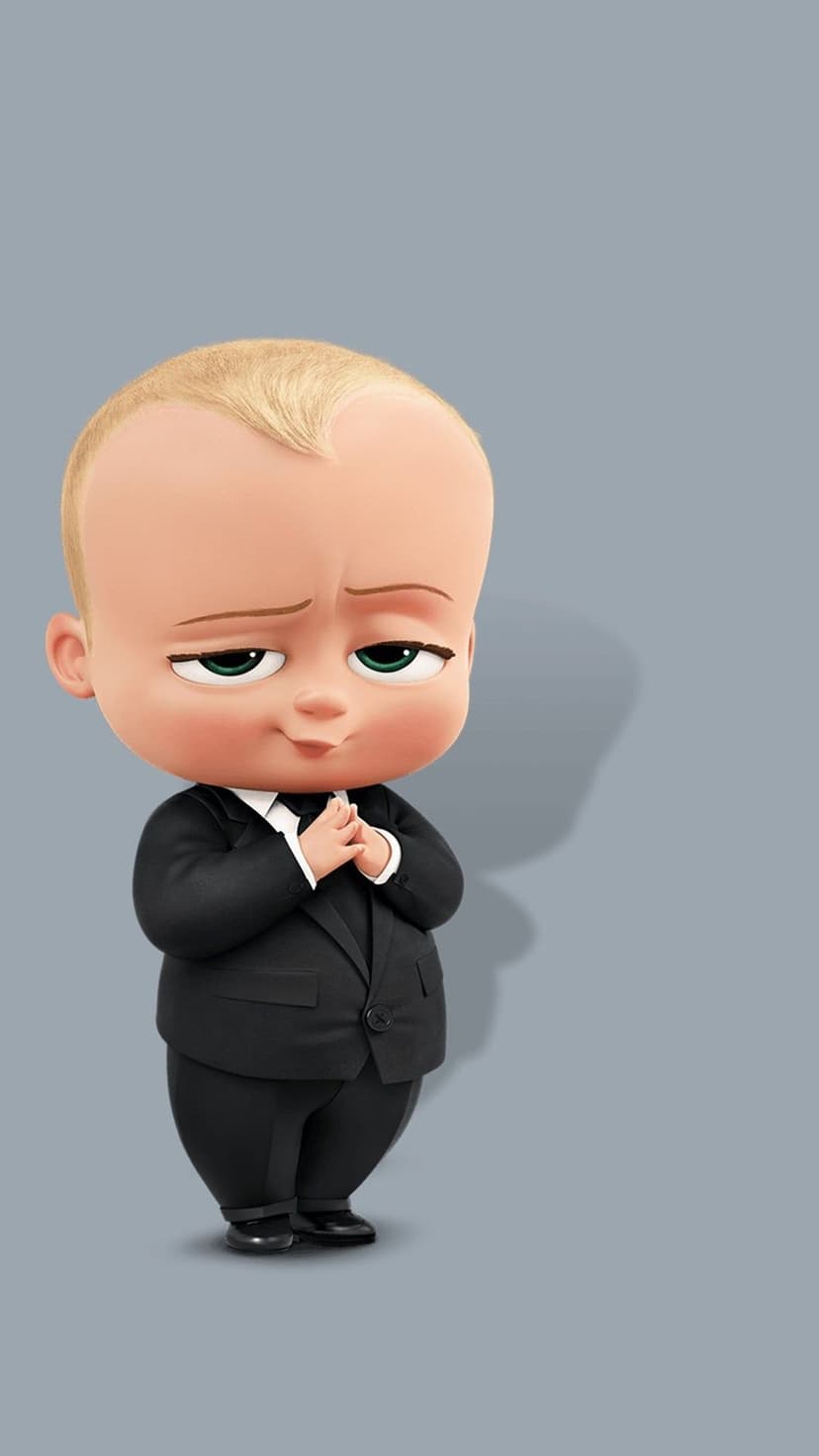 Boss baby in a black business suit stands with clasped hands against a soft grey background in a vertical view.
