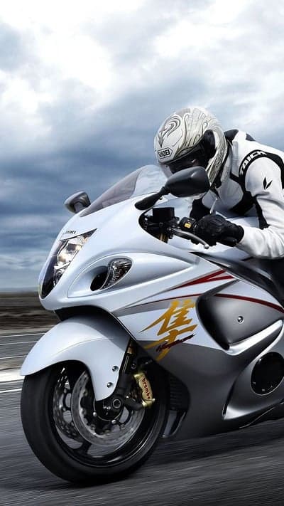 Rider on a White Suzuki Hayabusa Motorcycle