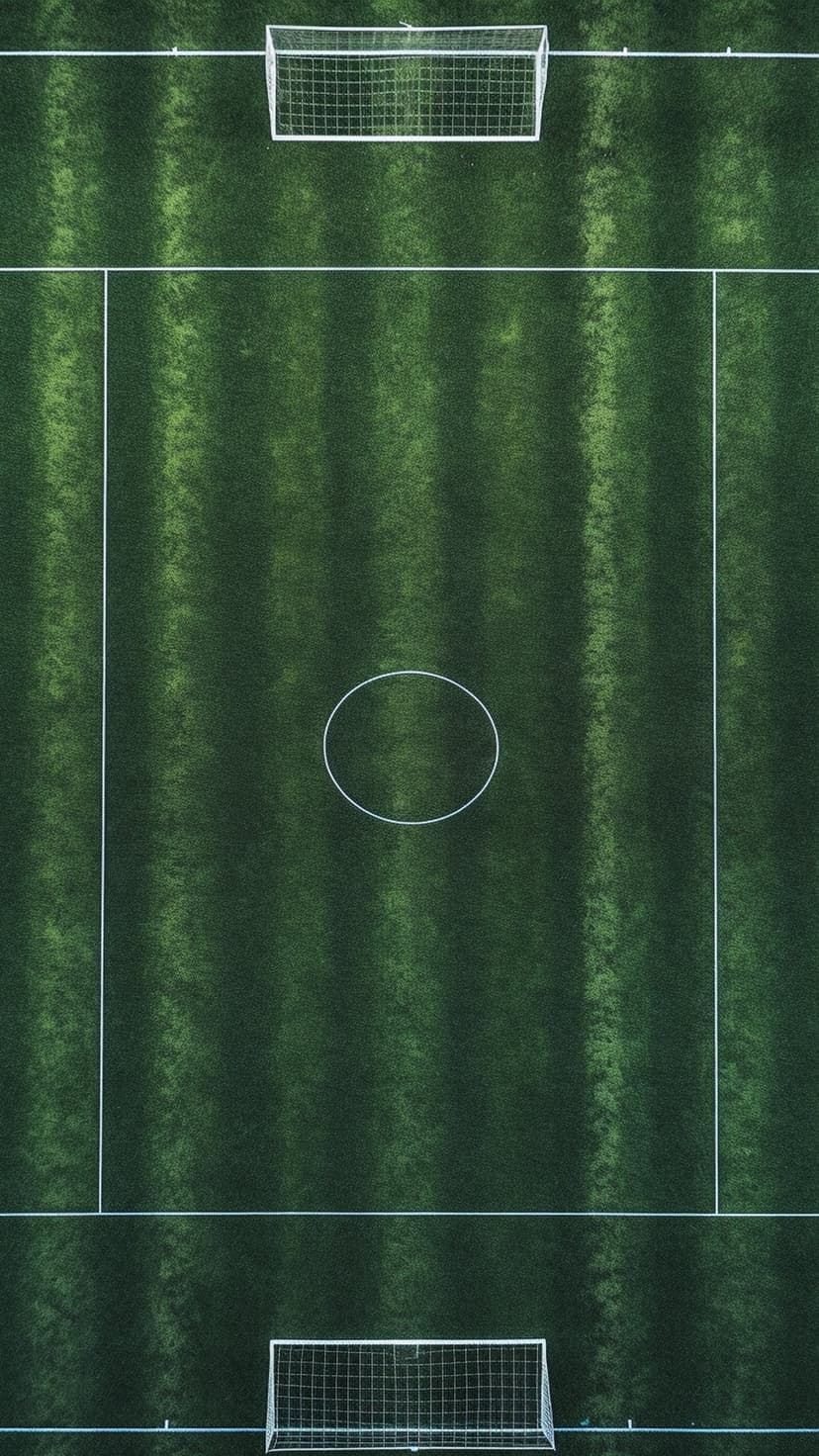 Meticulously mowed green soccer pitch with white boundary lines and goals captured from an overhead drone view.
