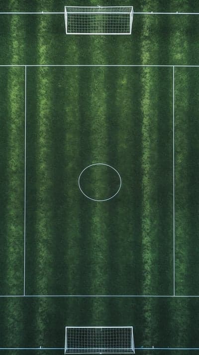 Aerial View of Empty Soccer Field with Goals and Center Circle