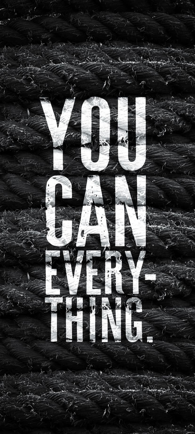 White distressed letters spelling You Can Everything on a dark background of thick, coarse braided hemp ropes.
