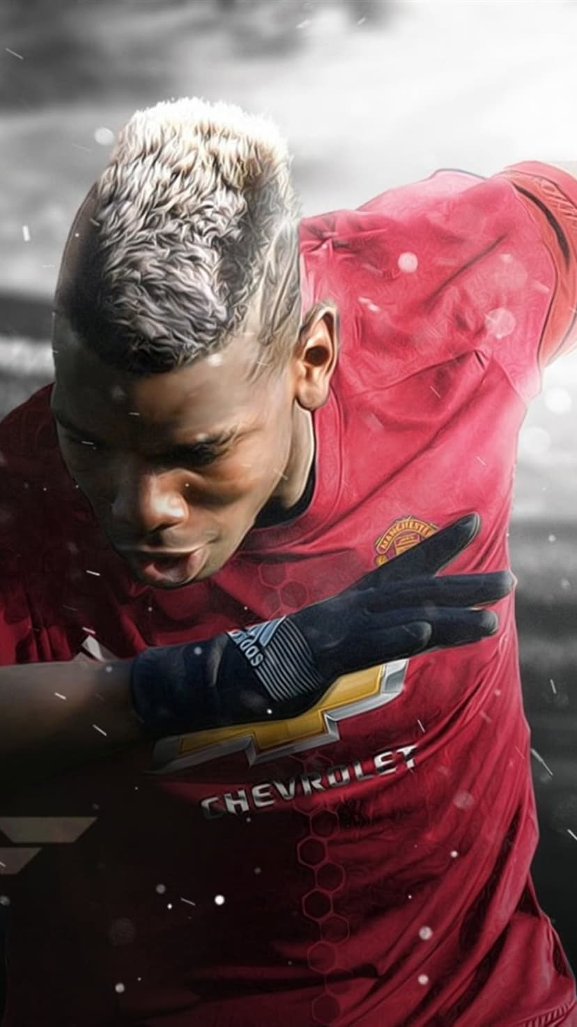Paul Pogba dabbing in a red Manchester United jersey with a blonde mohawk and black Adidas glove.
