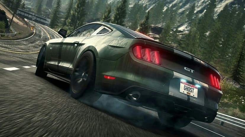 Green Mustang GT drifting on a winding mountain road with tire smoke, red taillights, and snowy peaks background.