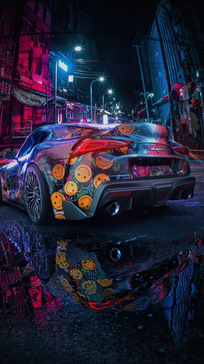 Toyota Supra with a yellow smiley face wrap parked on rainy asphalt reflecting glowing pink neon city lights.