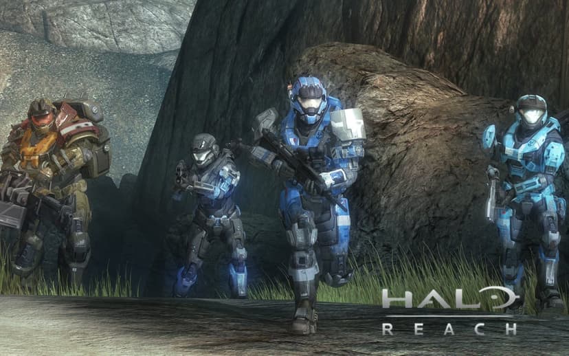Four armored Spartans move through a rocky canyon landscape with the Halo Reach logo in the foreground.