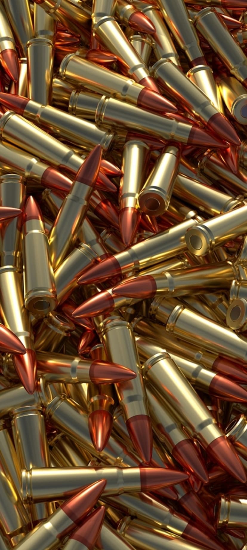 Ammunition bullets with gold brass casings and red tips stacked in a chaotic pile showing metallic textures.