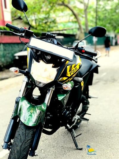 Vibrant Green Yamaha FZS Street Bike Phone Background