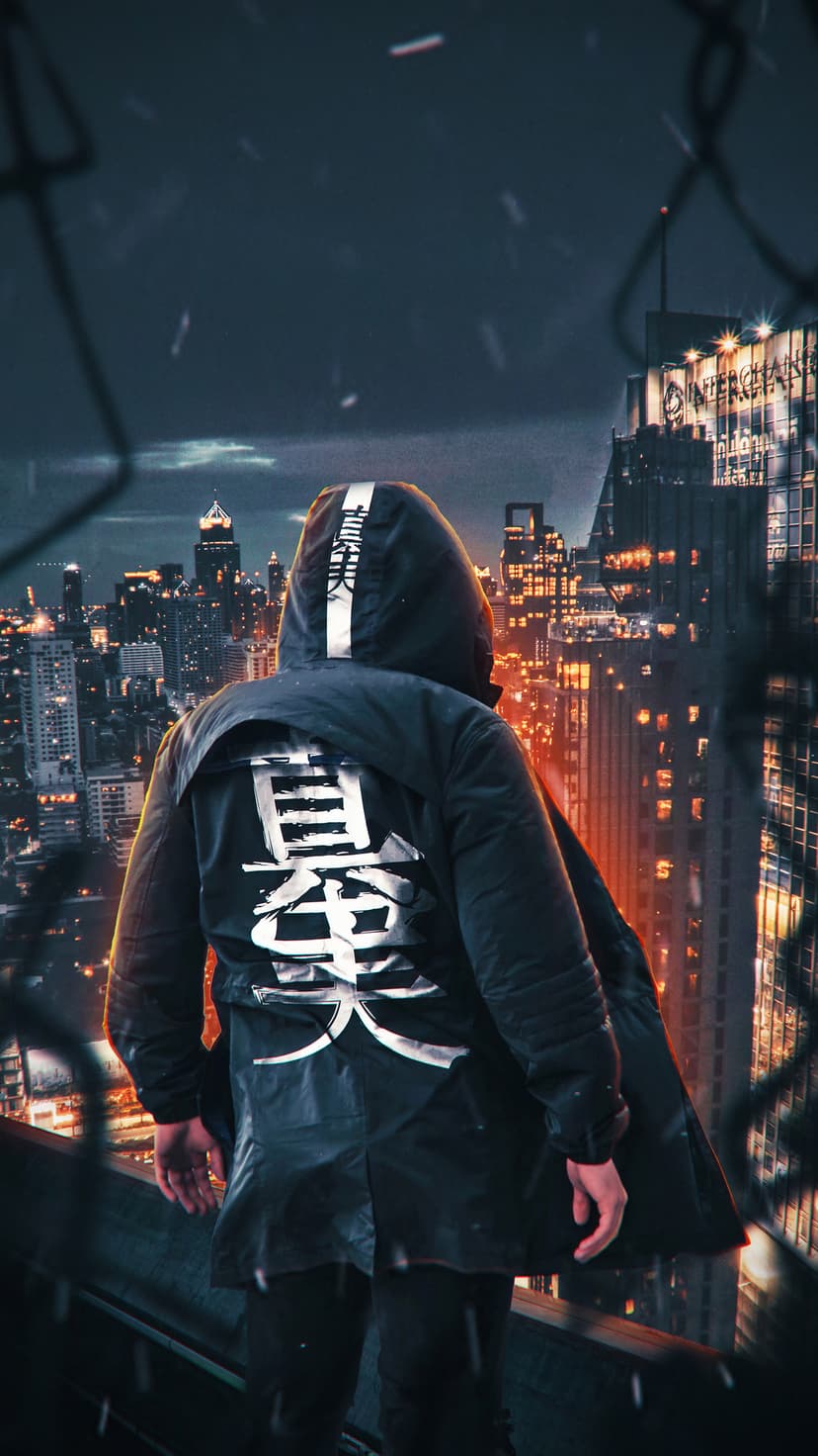 Person in a hooded trench coat with white Japanese text stands on a rainy roof above a glowing night city.