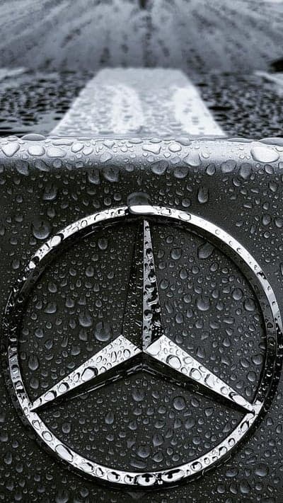 Monochrome Mercedes Emblem with Raindrops Phone Wallpaper