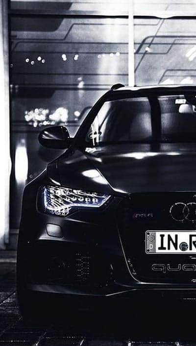 Sleek Black Audi RS6 Headlights and Grille