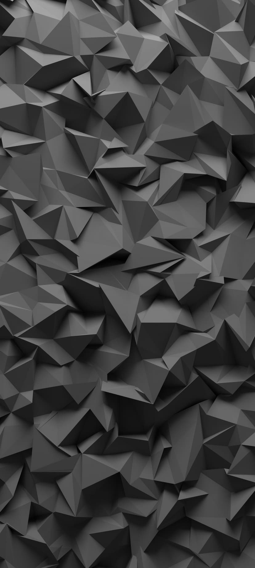 Charcoal grey polygonal triangles with sharp edges and shadows create a 3D textured geometric surface.