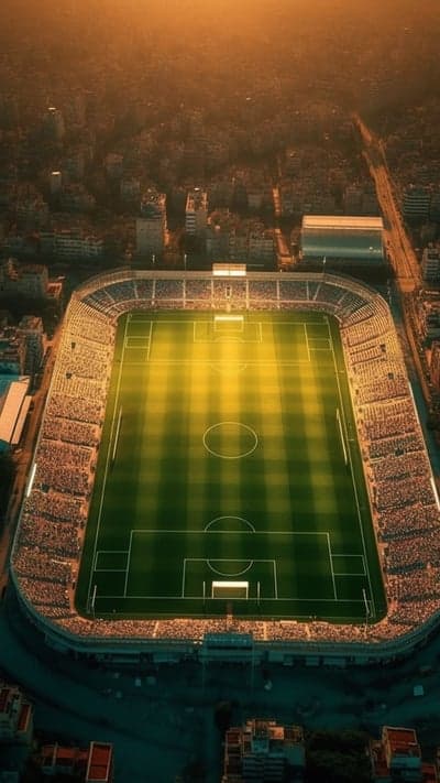 Aerial View of a Soccer Stadium at Sunset