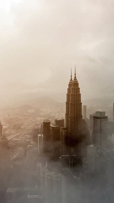 Mist-Shrouded Towers - Urban Vista in Sepia