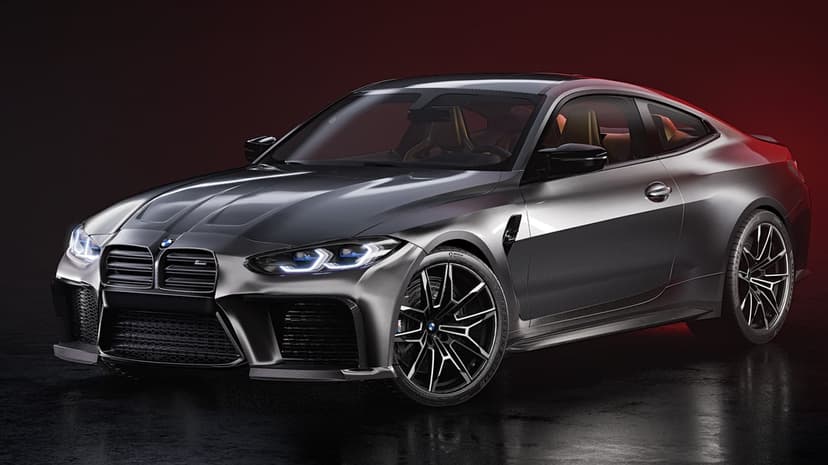 Grey BMW M4 sports car with glowing blue headlights parked on a reflective surface against a red background.