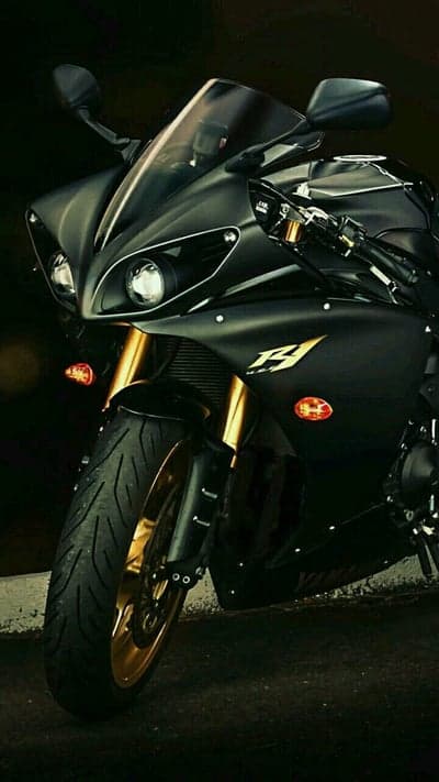 Sleek Black Yamaha R1 Motorcycle with Gold Accents