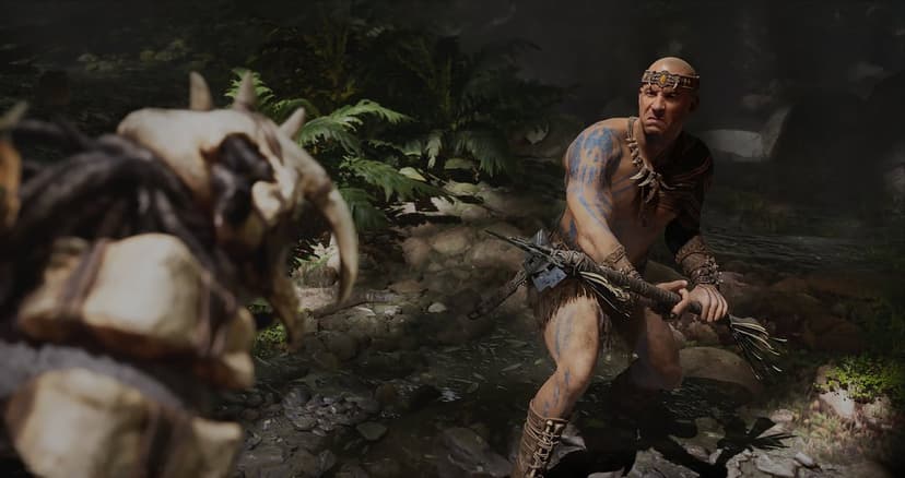 Santiago warrior with blue tattoos holding a bone spear in a dark jungle stream surrounded by lush green ferns.