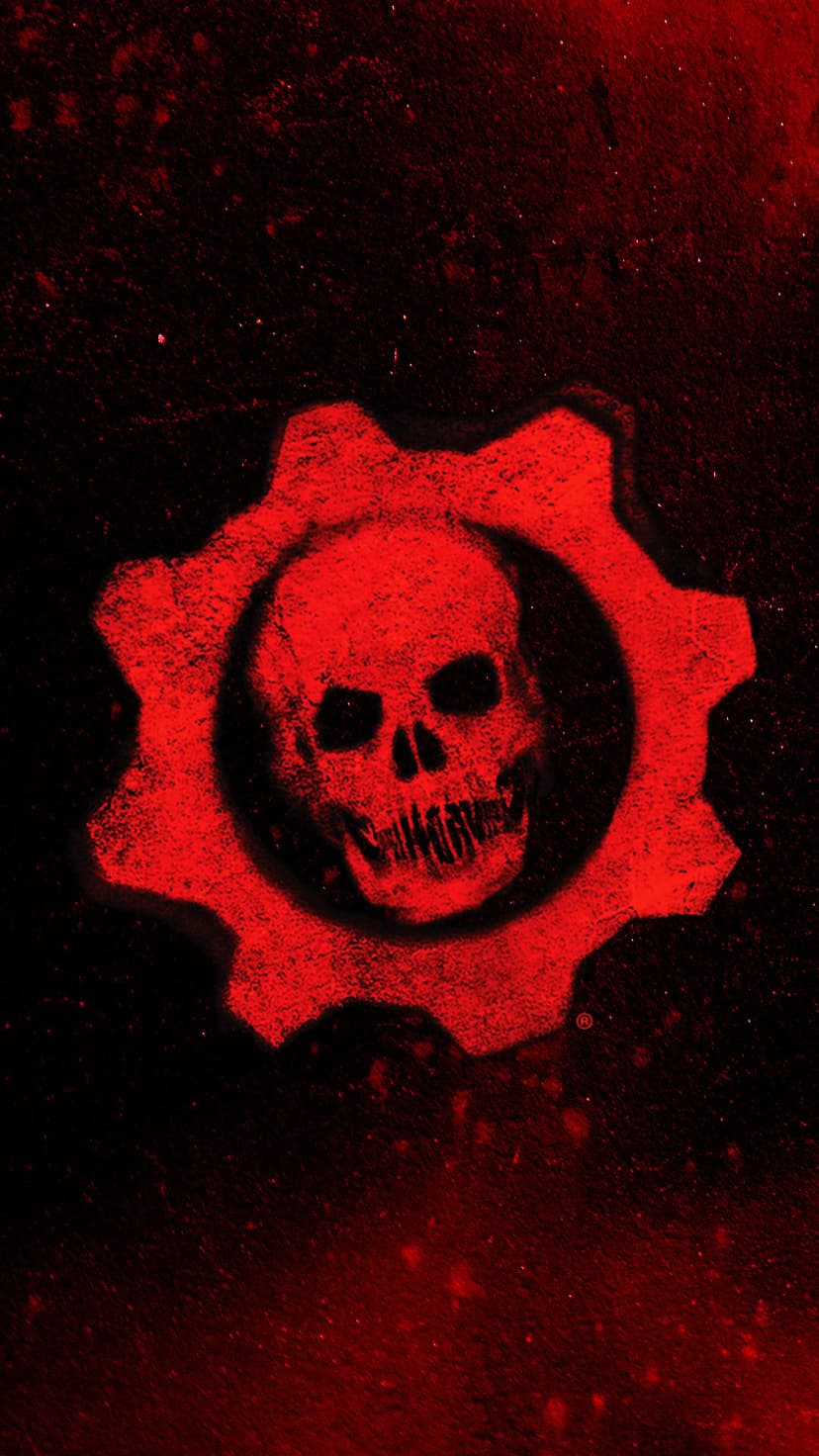 Crimson skull inside a metal gear with distressed red texture and splattered paint against a dark surface.