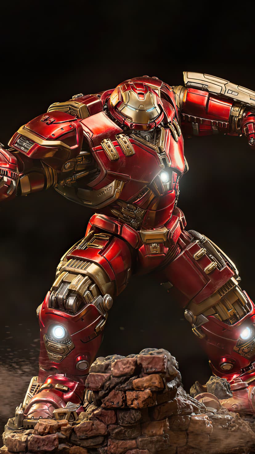 Hulkbuster suit features red and gold metallic plating with glowing blue accents and a bulky mechanical frame.
