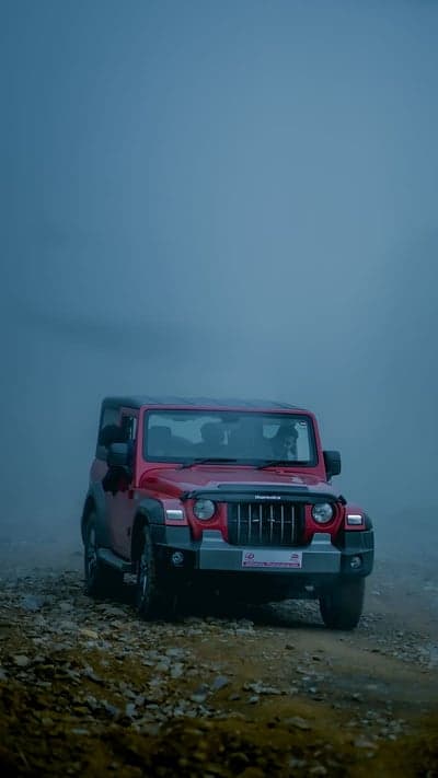 Red Mahindra Thar Misty Mountain Trail 4x4 Mobile Wallpaper