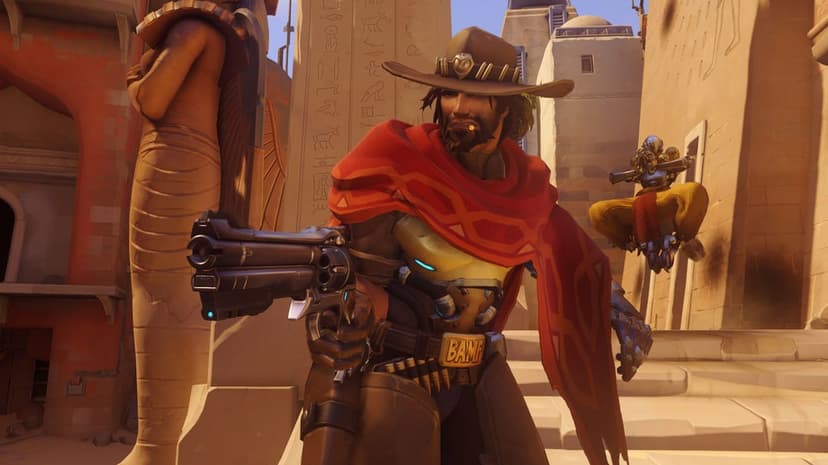 Cassidy holding a revolver with Zenyatta floating in the background near Egyptian desert ruins and hieroglyphs.