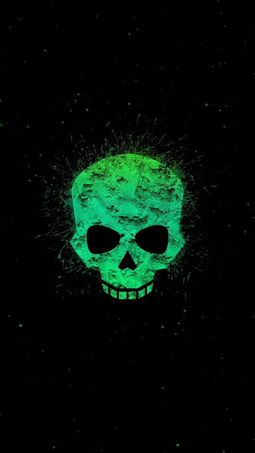 Green textured skull with dark eye sockets surrounded by an explosion of neon green particles on a black backdrop.