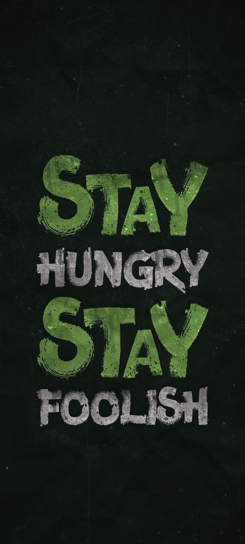 Stay Hungry Stay Foolish quote in weathered green and grey letters centered on a dark textured background.