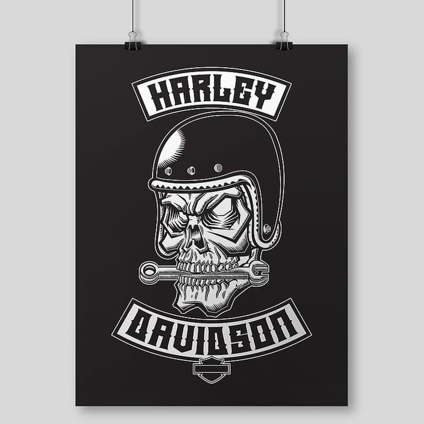 Skull wearing a motorcycle helmet and biting a metallic wrench, centered against a clean monochrome backdrop.