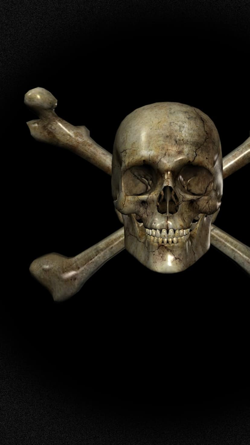 Weathered human skull with aged crossbones centered on a solid black background showing cracks and bone texture.