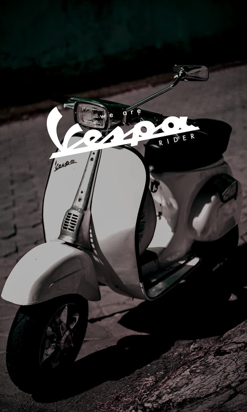 White vintage Vespa scooter parked in dim lighting with "We Are Vespa Rider" typography on a vertical frame.