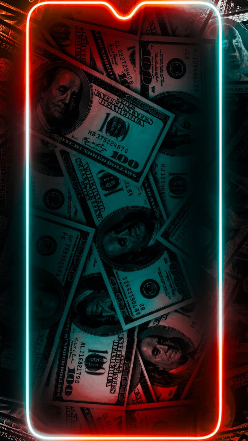 Pile of hundred-dollar bills illuminated by vibrant cyan and red neon lights in a dark, high-contrast setting.