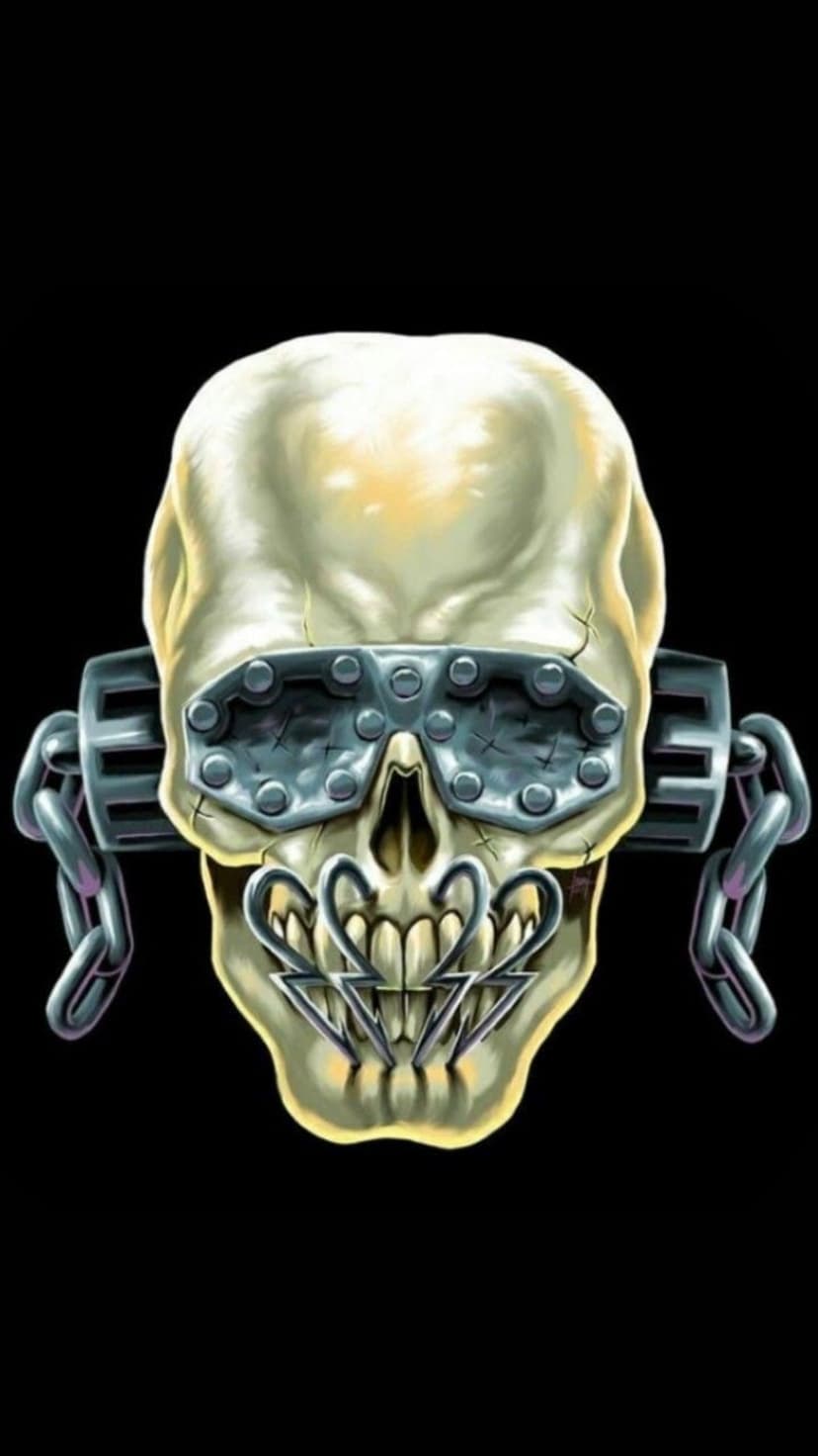 Weathered skull wearing riveted goggles and a jagged metal muzzle with thick iron chains on a dark background.